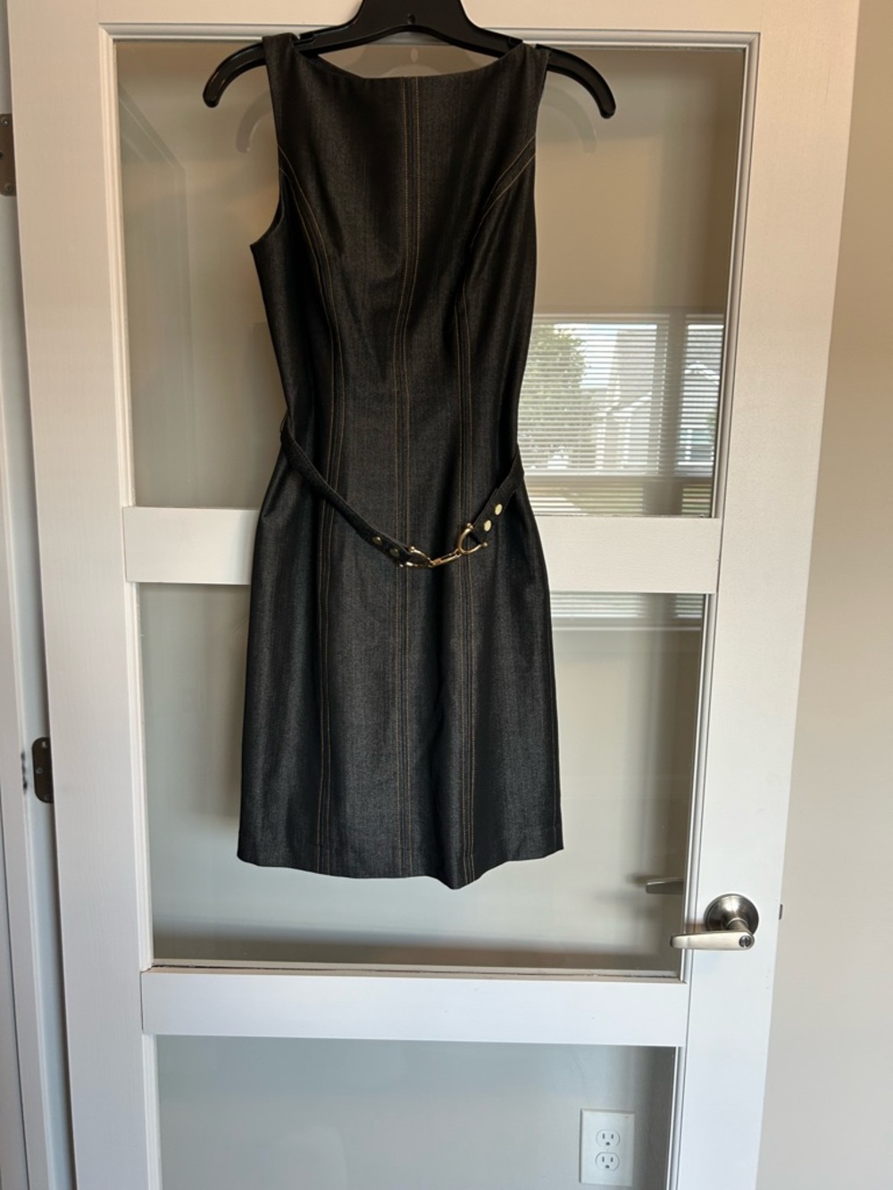 Classic Sleeveless Black Sheath Dress with Gold-Accent Belt